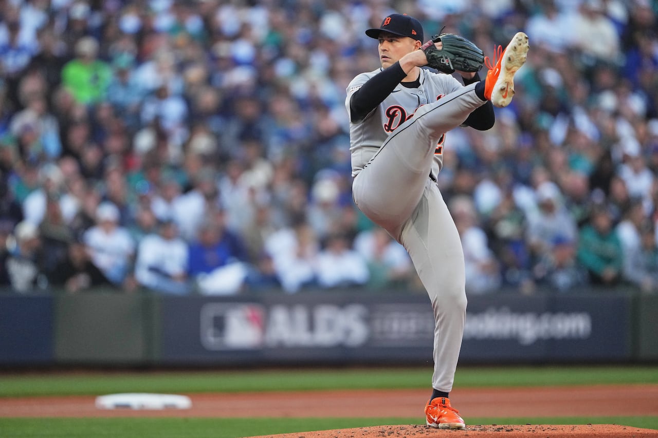 Tarik Skubal, in Detroit Tigers Uniform, winds up for a pitch in a major league game in October