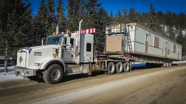Modular home on a semi truck arrives in Jasper. Modular home on a semi truck arrives in Jasper.