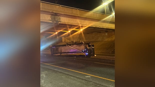 Man arrested after dump truck crashes into Vaughan highway overpass: OPP | CBC News