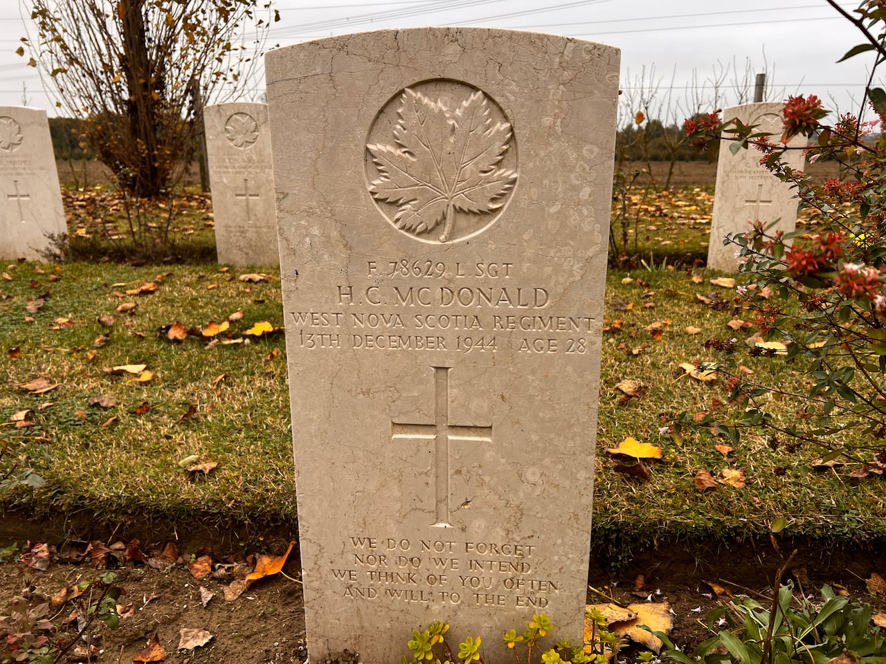 The grave of a Canadian WWII soldier killed in action in Italy is shown.