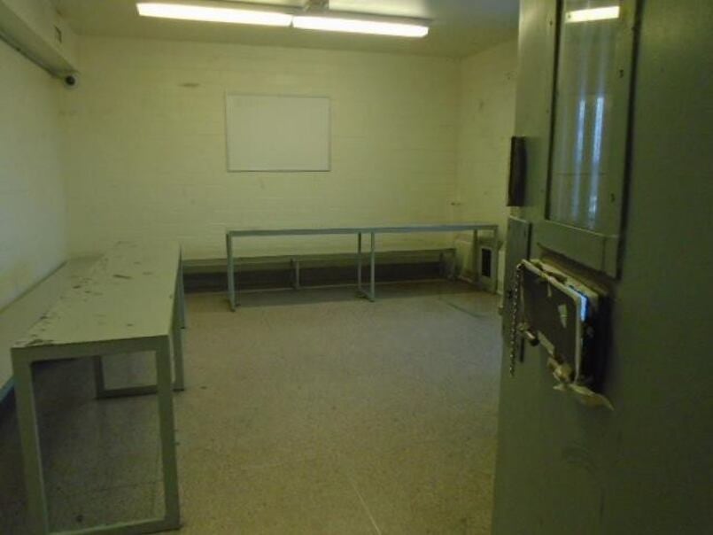 Photo of a cell with two tables.