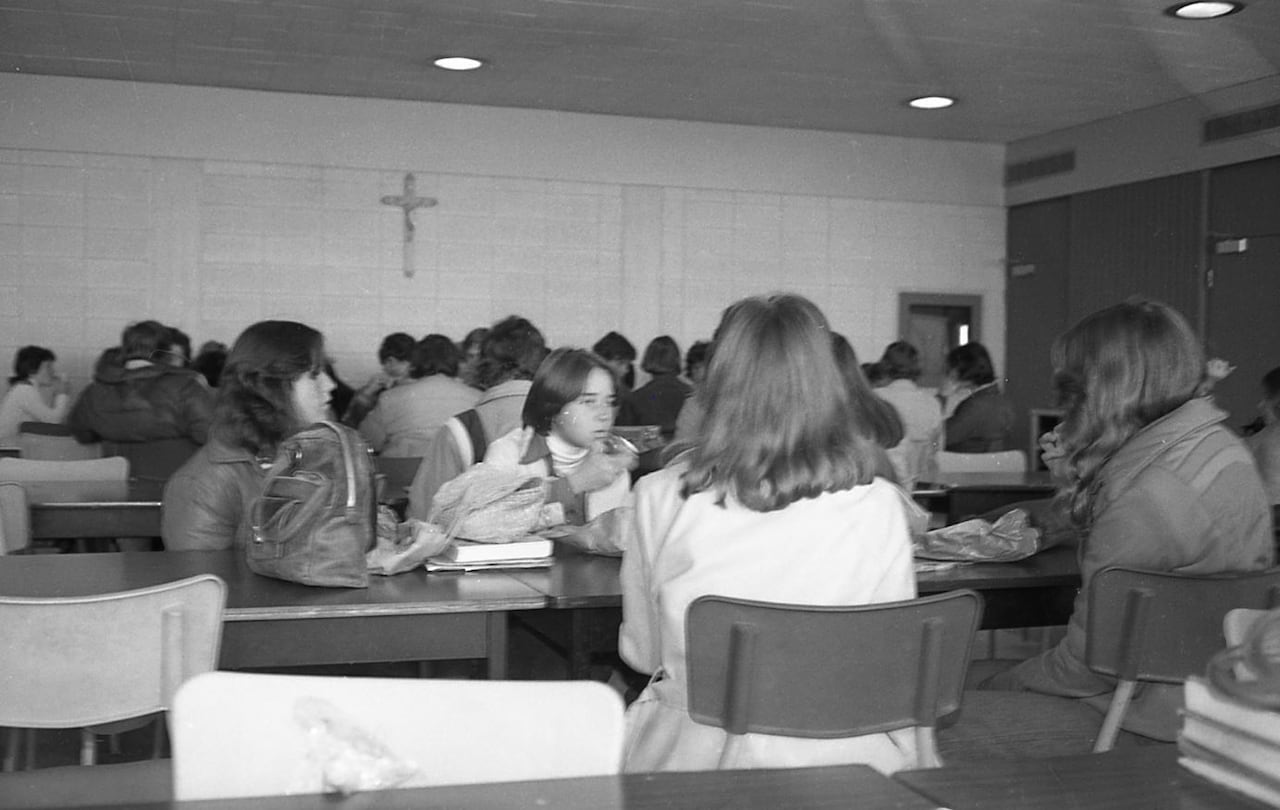 Students mingle in the St. Pius X High School cafeteria in the mid to late 1970s.