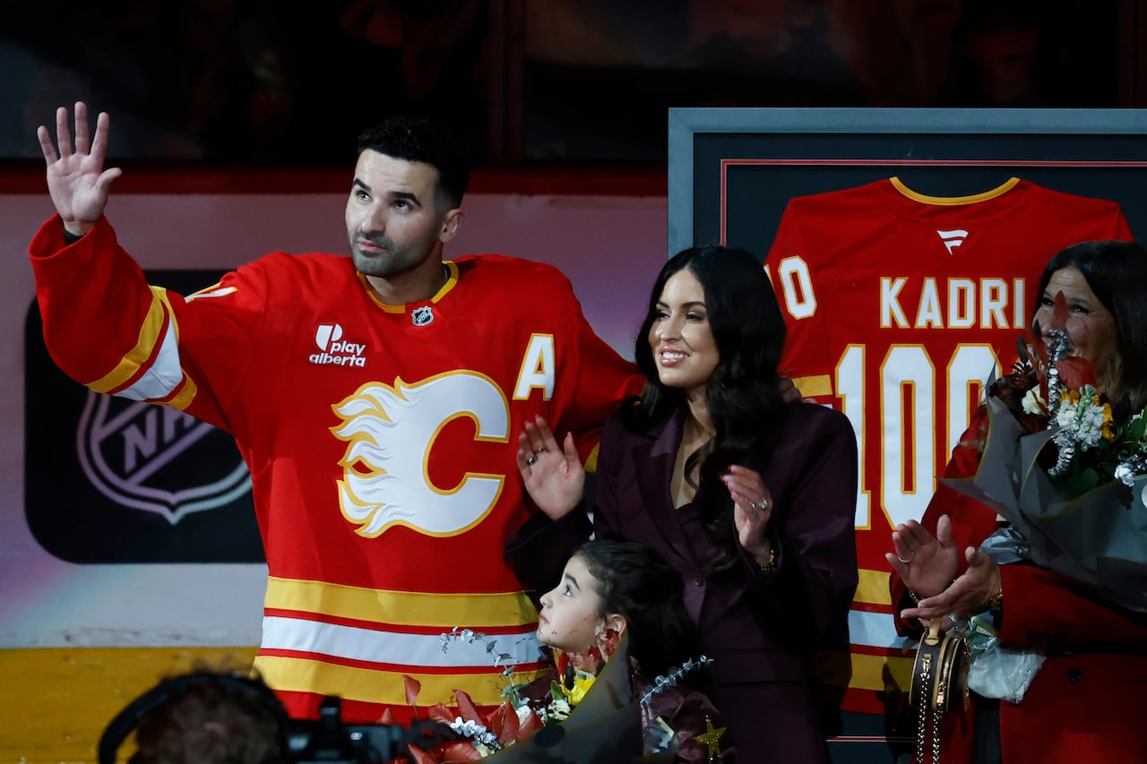 Calgary Flames' Nazem Kadri is honoured with a metallic  stick.