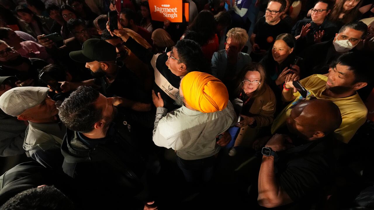 A antheral   greets supporters astatine  a governmental  rally.