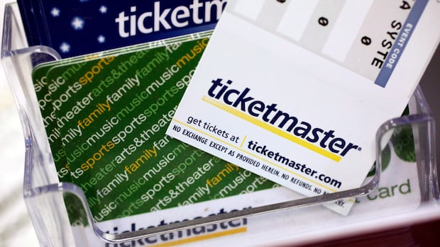 Printed ticket stubs are shown inside a clear plastic holder