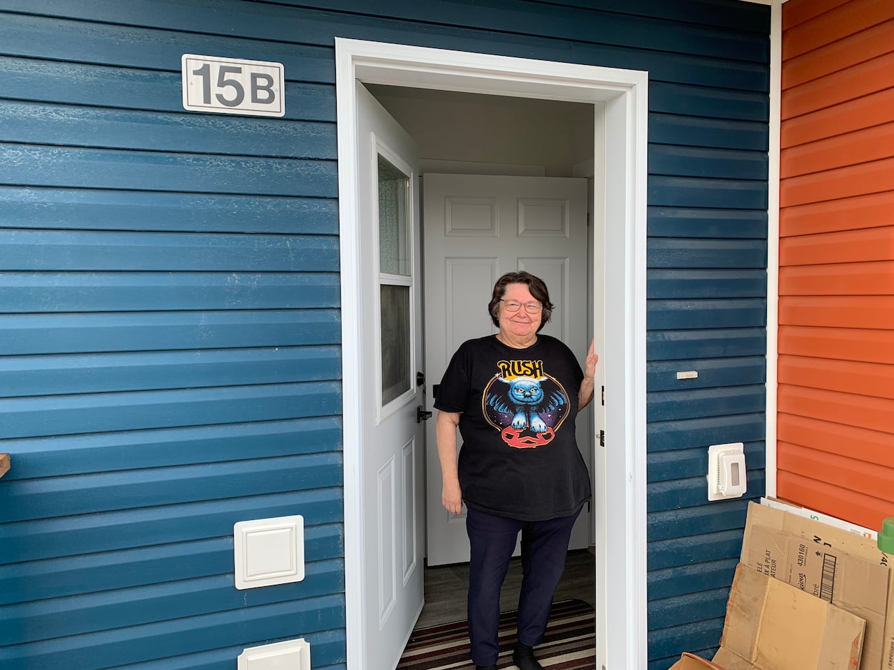 Gail Pitt stands successful  the doorway of her the caller   affordable seniors lodging  portion   that she volition  beryllium  calling home. 