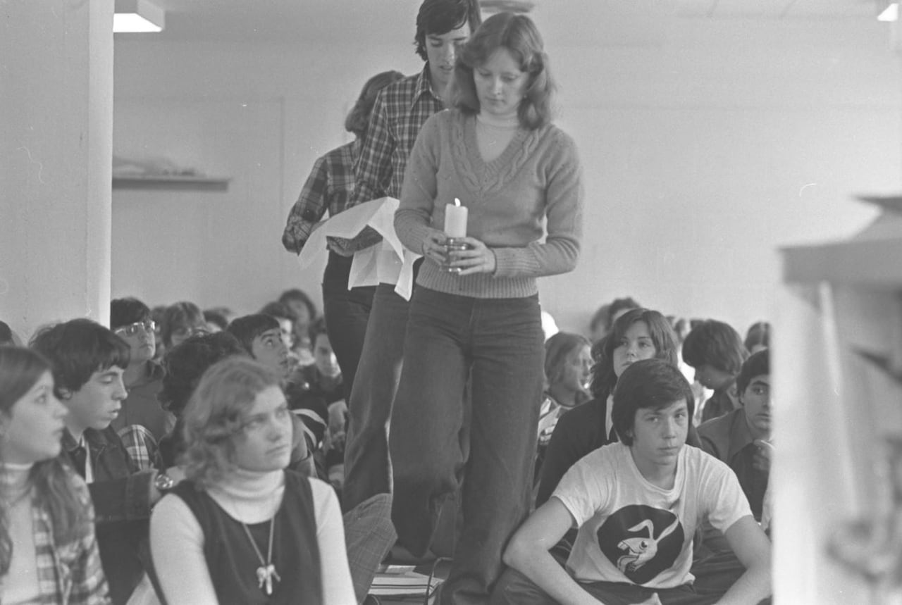 Some students objected to the media being present for the mass on Oct. 28. But the school principal, Father Len Lunney, insisted they stay. 'The press covers us in our victories, and we love that,' teacher Pat Jennings recalls Lunney saying. 'This is