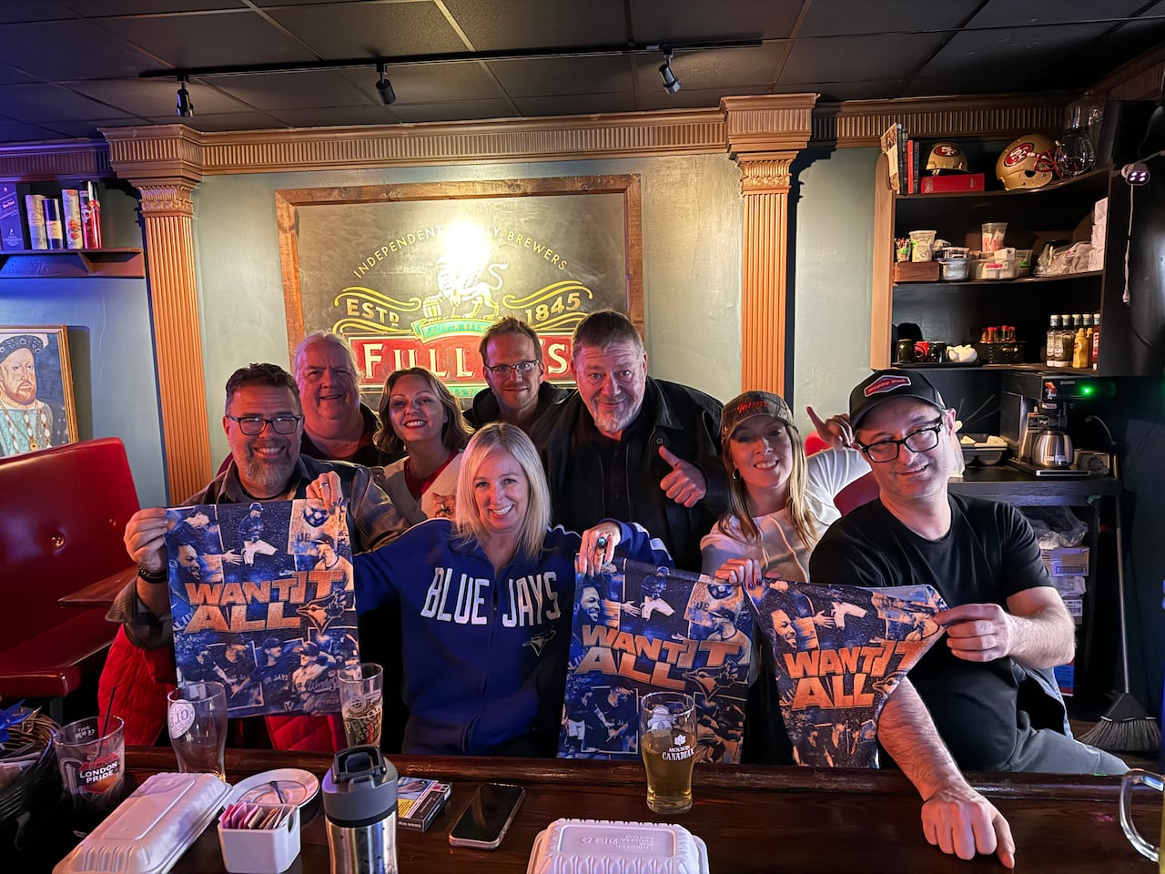 Kristen Black (second to the right) poses with Jay's fans and visitors to her pub successful Etobicoke.