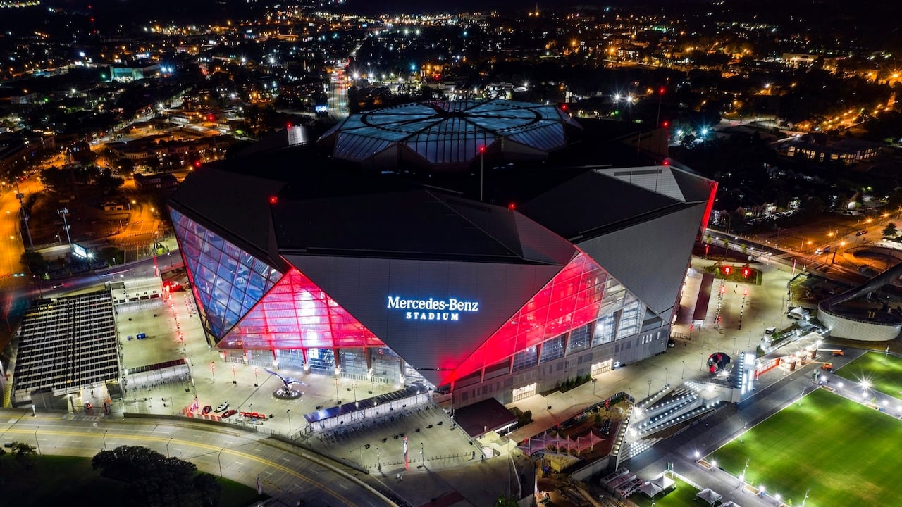 An aerial picture of a football stadium at night.
