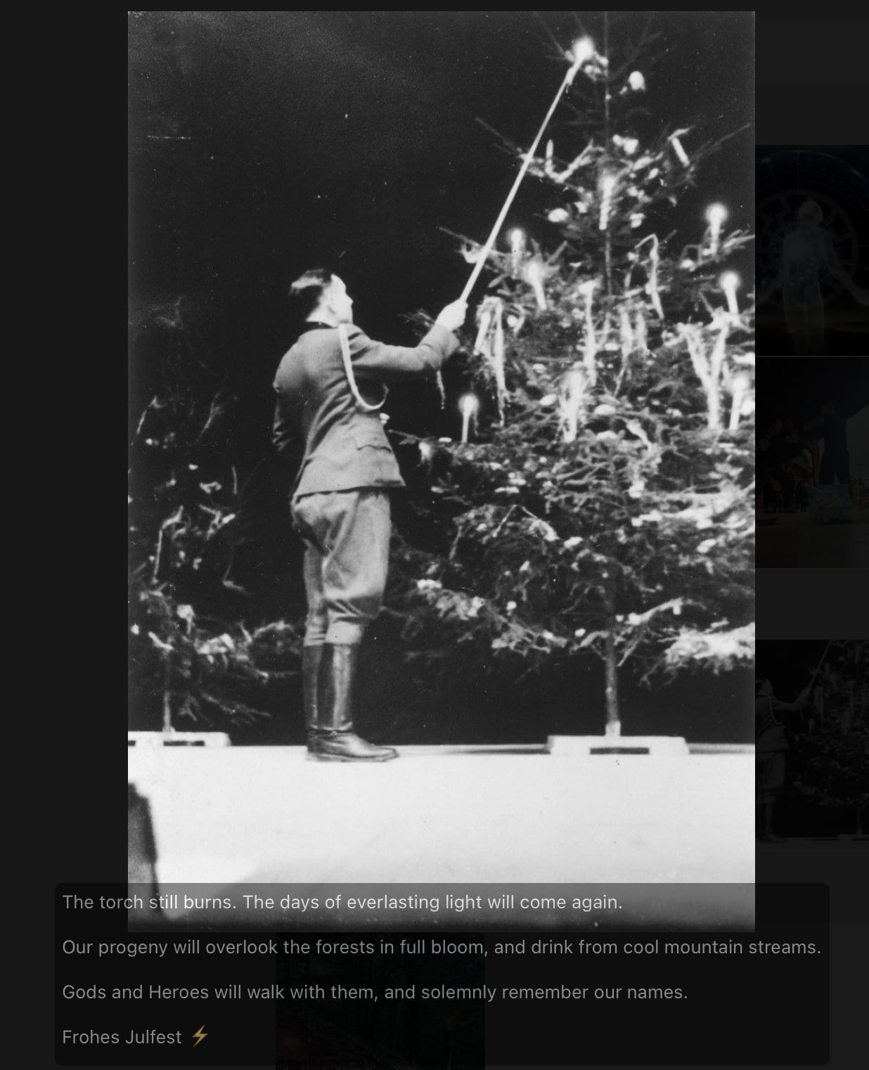 A Nazi officer lights a Christmas tree.