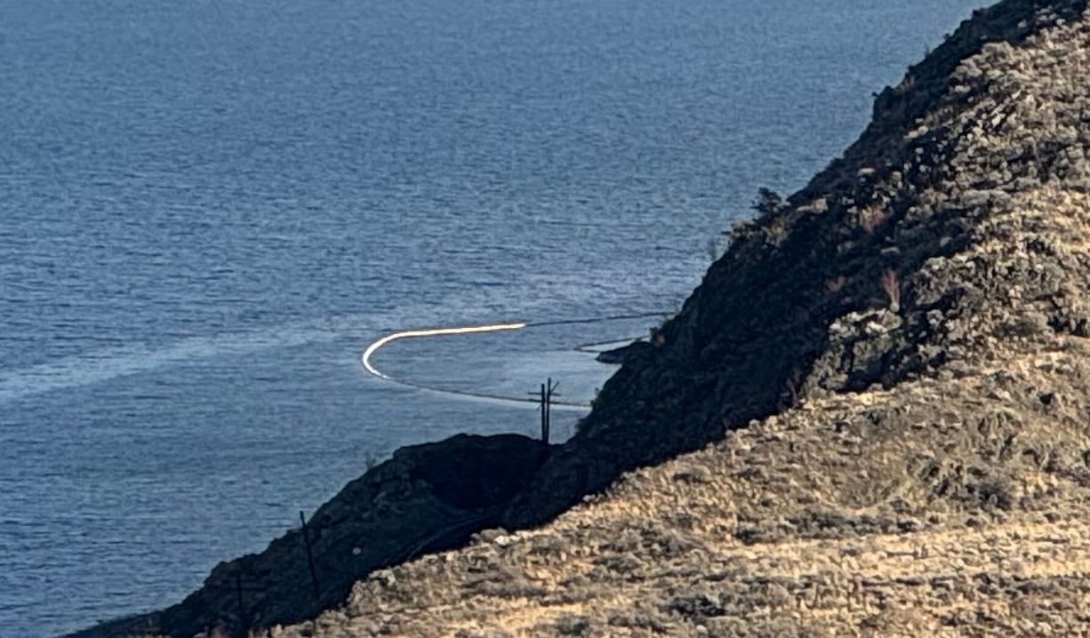 A roar containment instrumentality has been deployed connected Kamloops lake.