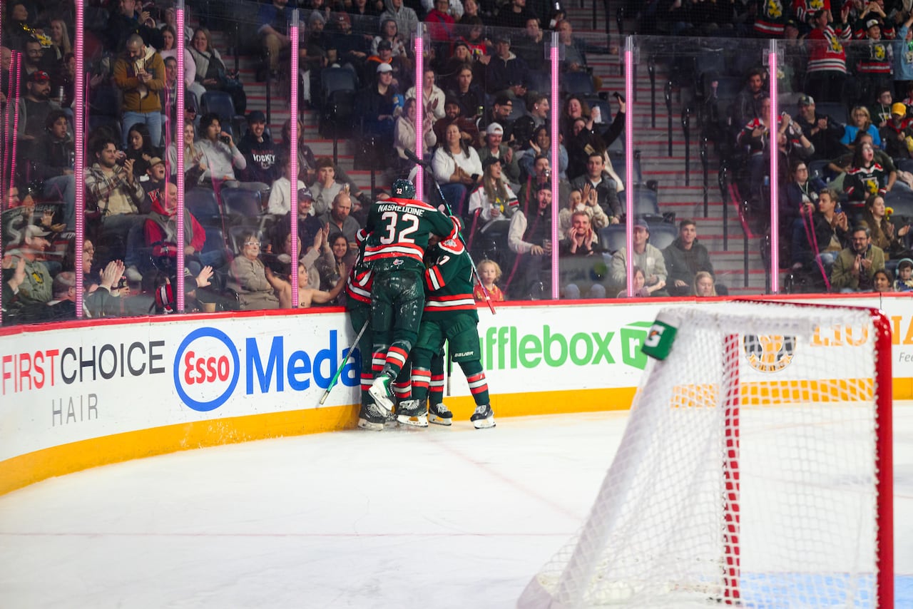 Halifax Mooseheads players celebrate a goal against the Newfoundland Regiment in a game Oct. 17, 2025, at the Scotiabank Centre.