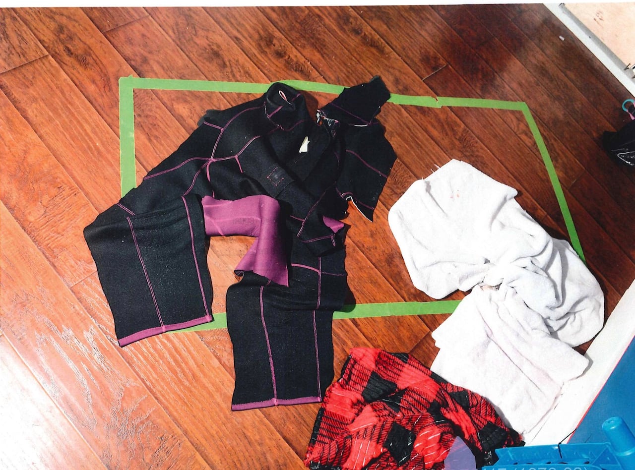 wet suit on ground