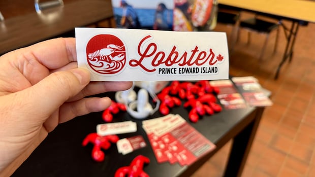Promotional stickers being handed out by Lobster Prince Edward Island. Promotional stickers being handed out by Lobster Prince Edward Island.