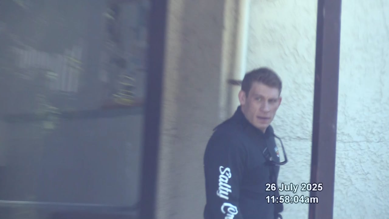 A man outside of a building.