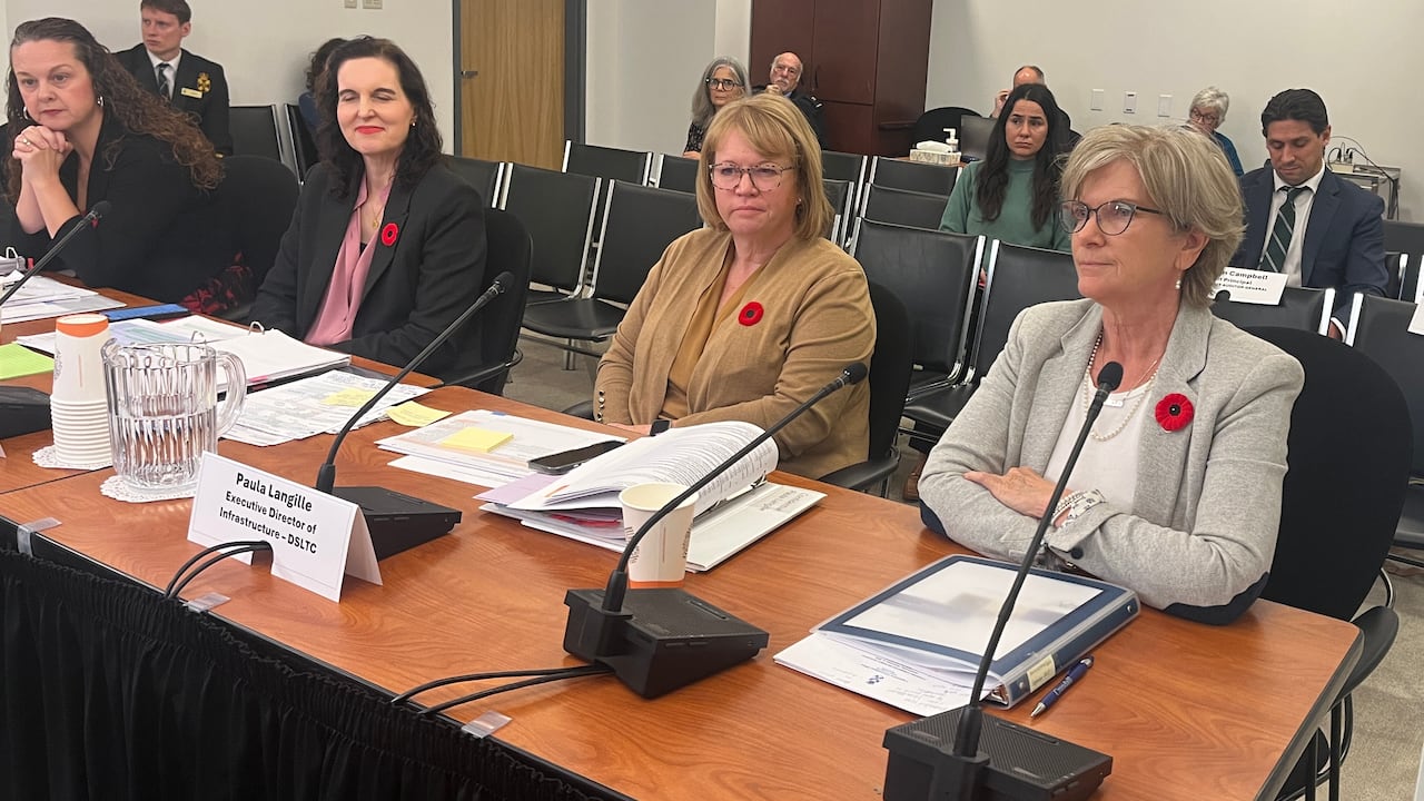 Four radical beryllium astatine a array with microphones successful beforehand of them.