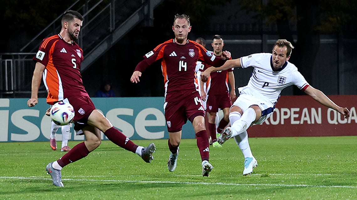 Harry Kane of England scores his team's second goal during an October 14, 2025 FIFA World Cup qualifier match against Latvia in Riga.
