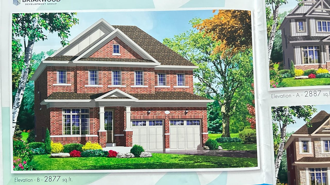 One drawing shows a three-story brick house with a two-car garage.