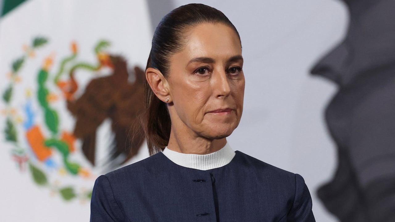 A photograph of a woman with a serious look on her face.