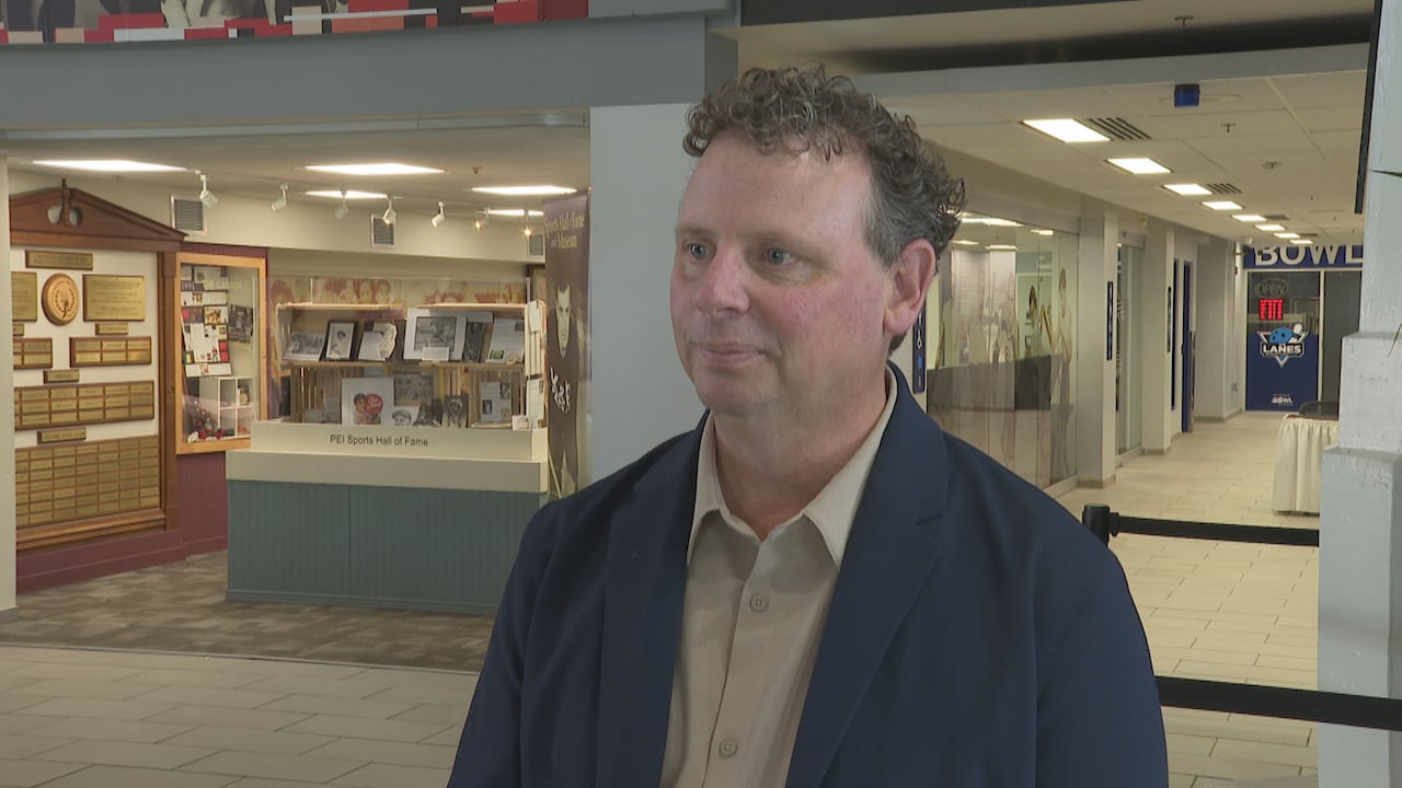 A antheral successful a bluish suit jacket.