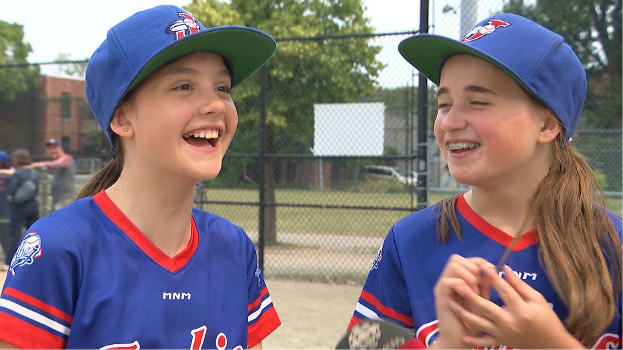 Girls play baseball at this Montreal park. The city wants to turn it into a library