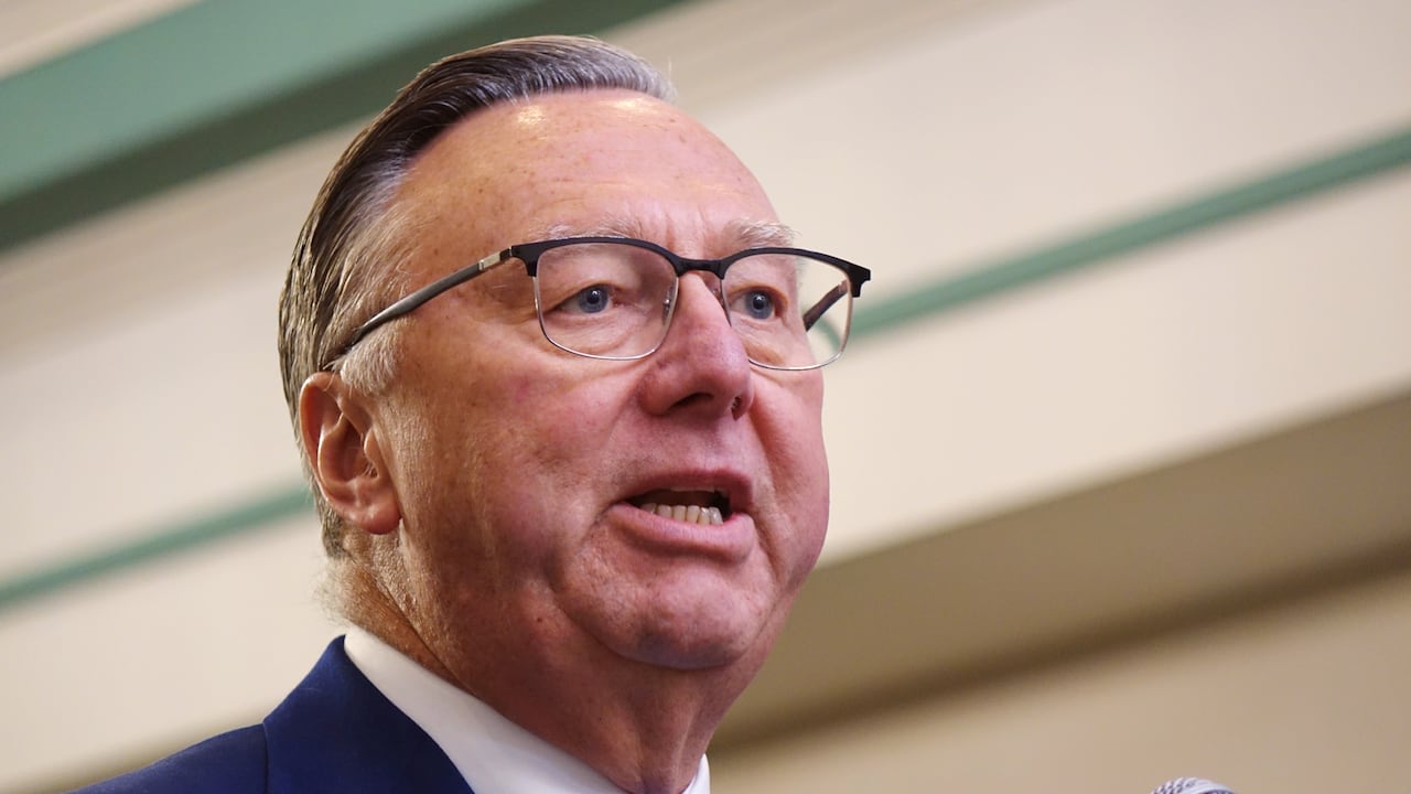 Close up changeable of antheral speaking into mic