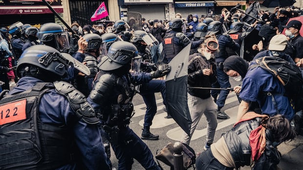 Riot police charge and clash with protesters near the Gare du Nord train station during the social protest movement Bloquons tout in Paris France on September 10, 2025. (Photo by Bastien Ohier / Hans Lucas via AFP) (Photo by BASTIEN OHIER/Hans Lucas/AFP via Getty Images) Riot police charge and clash with protesters near the Gare du Nord train station during the social protest movemen in France on September 10, 2025.