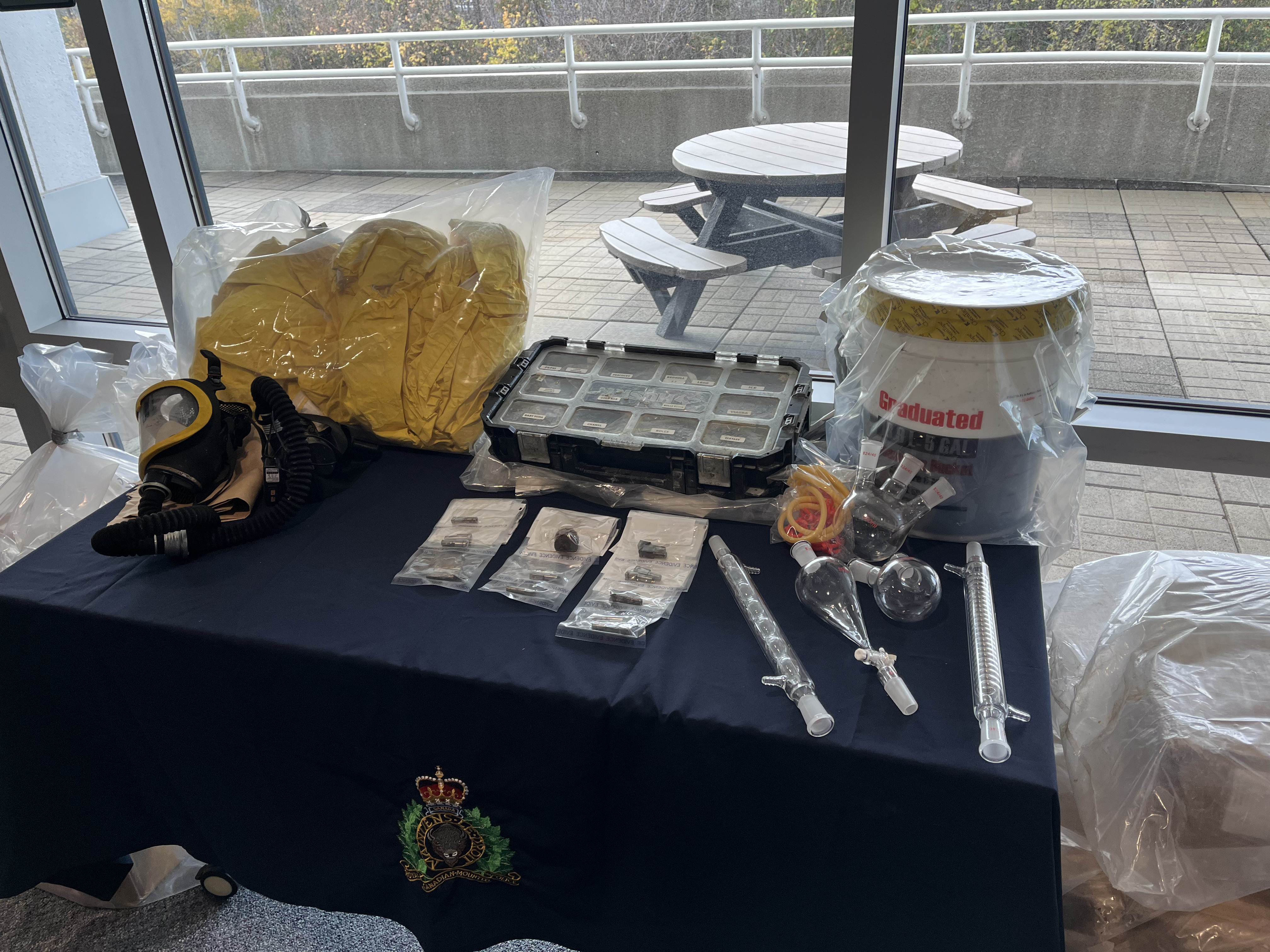 RCMP dismantles large-scale synthetic drug lab in southern Ontario village; During a search on Sept\. 7, police say they found a pill press, drug recipes, flasks and chemical glassware used to aid in the production of the illicit substances\.