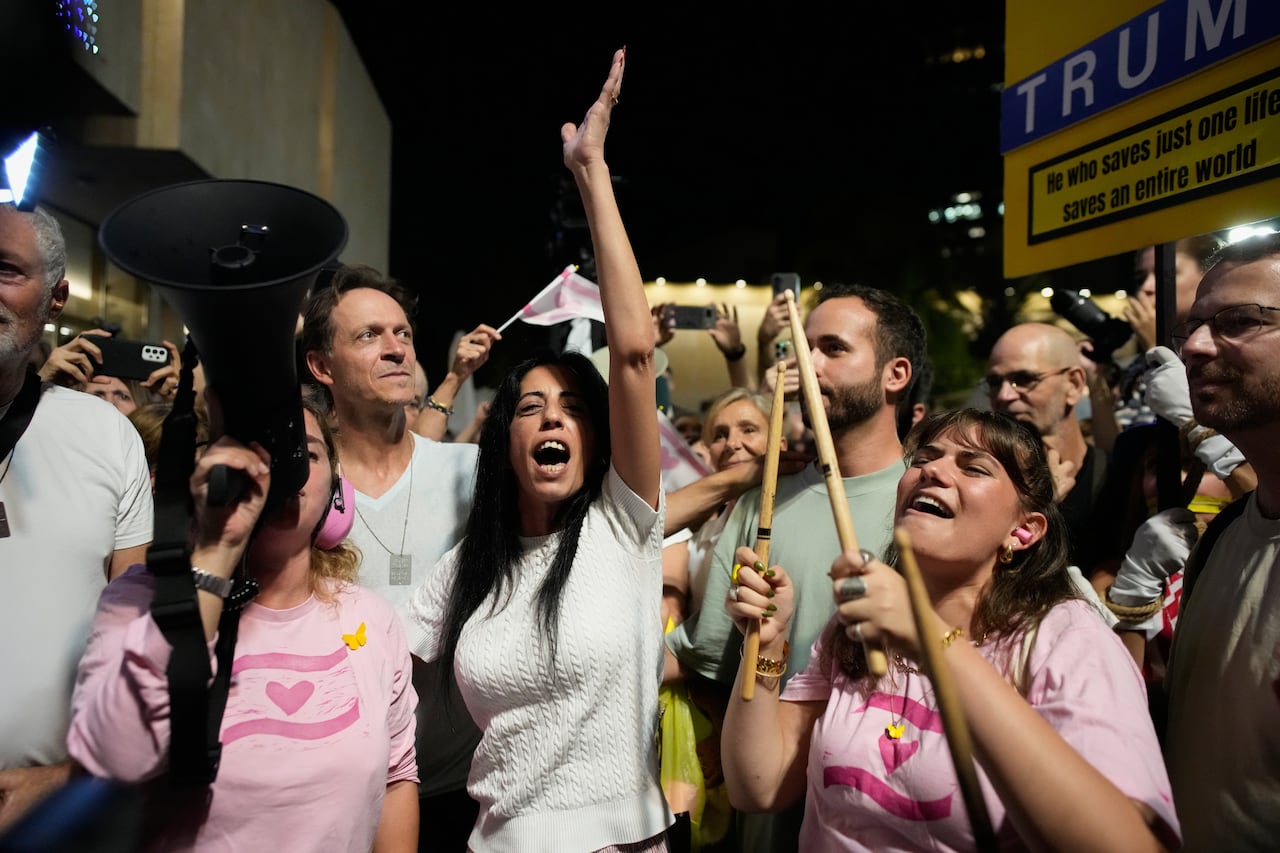 A group of people standing together to celebrate