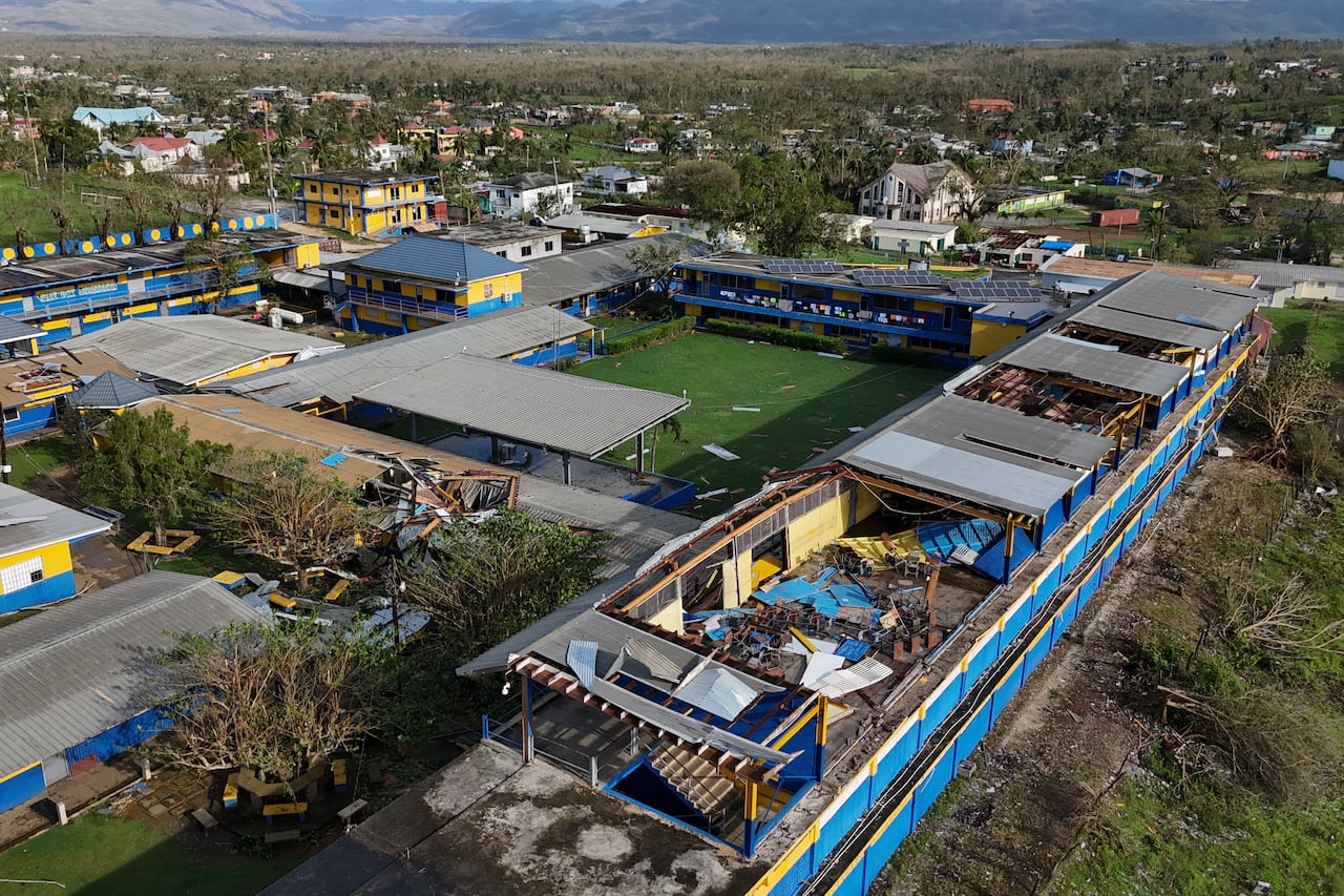 Parts of the roof of the St. Elizabeth Technical High School are missing in Santa Cruz, Jamaica, Wednesday, Oct. 29, 2025, after Hurricane Melissa passed.