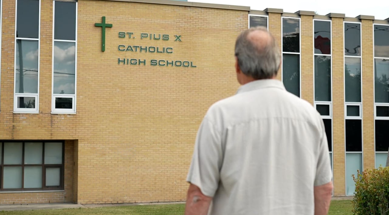 'Even after 50 years, it still seems to always rear its head every once in a while,' says shooting survivor Terry Vanden Hanenberg, pictured outside St. Pius X High School in Ottawa on Aug. 1, 2025.