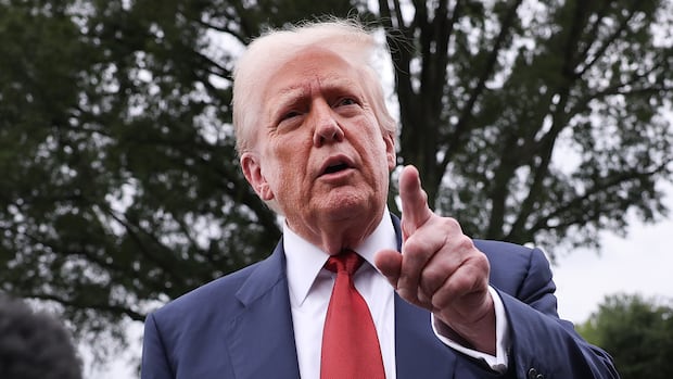 A man gestures