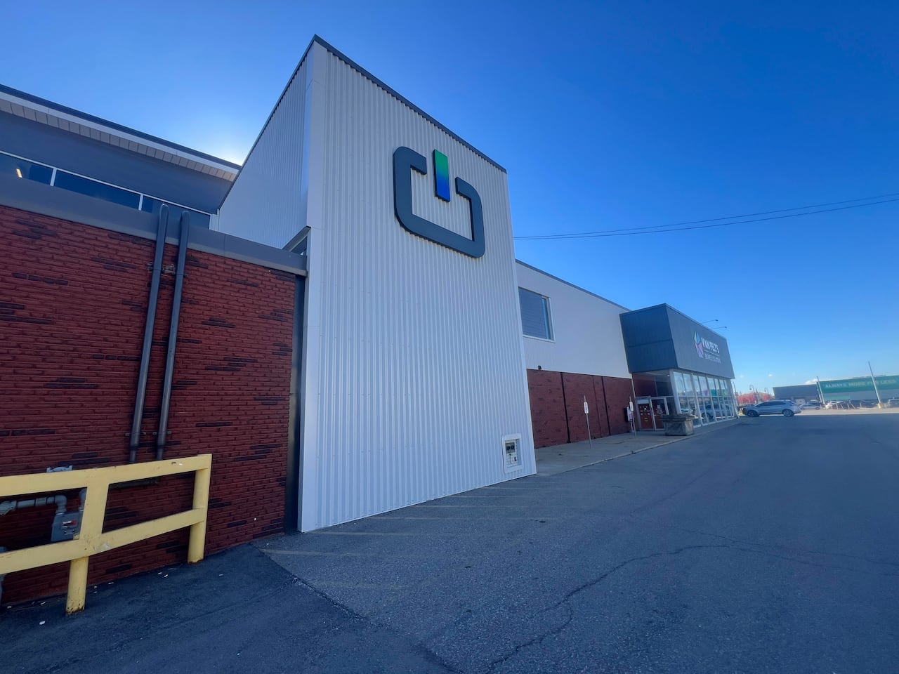 The exterior of PowerCo's impermanent  bureau   successful  downtown St. Thomas