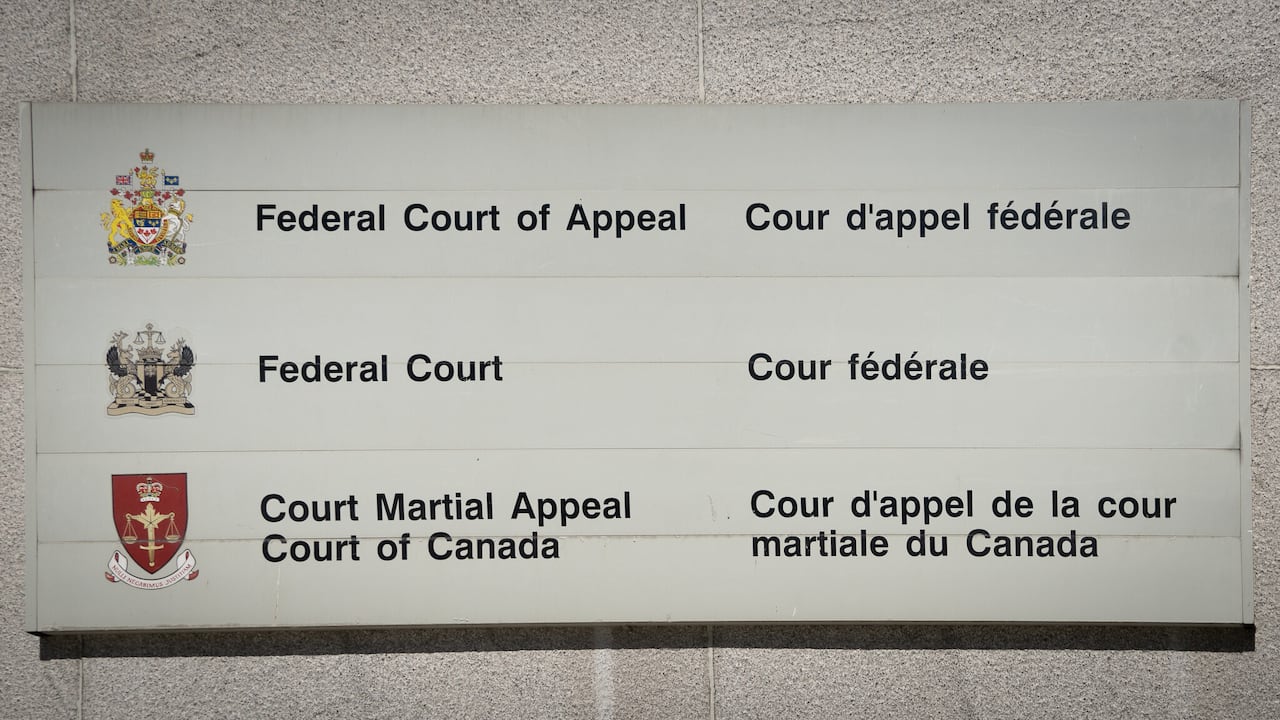 A sign reads FEDERAL COURT OF APPEAL / FEDERAL COURT / COURT MARSHALL APPEAL COURT OF CANADA'