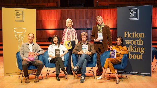 Authors pose with books