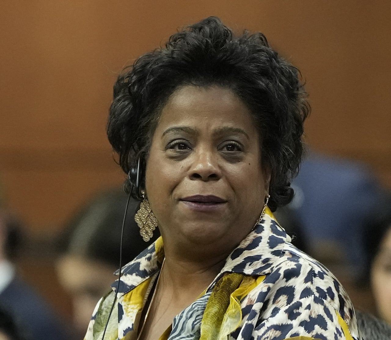 A Black woman stands up to speak in the House of Commons in Ottawa.