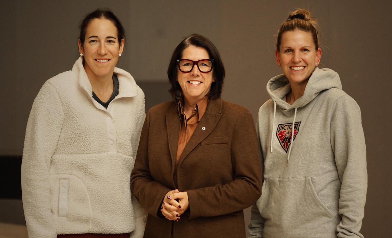 Caroline Ouellette, Daniele Sauvageau and Kim St-Pierre were all part of the 2002 gold-medal women's hockey team.