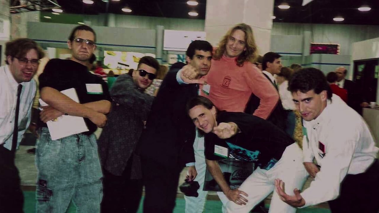 Old photo of young adult men from roughly the 1990s.
