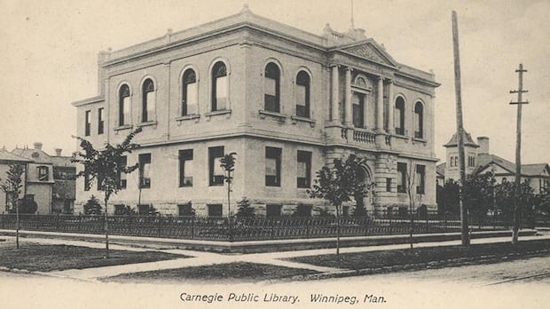 The Carnegie Library as it appeared around 1910. Black and white photo of a three-storey stone building