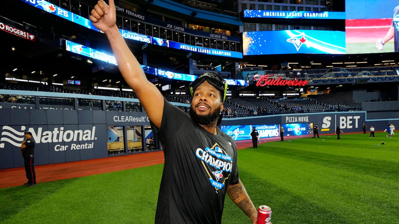Toronto Blue Jays' Vladimir Guerrero Jr. gestures to fans as the Blue Jays celebrate after defeating the Seattle Mariners in MLB American League Championship Series game 7 baseball action in Toronto, Monday, Oct. 20, 2025. THE CANADIAN PRESS/Frank Gu