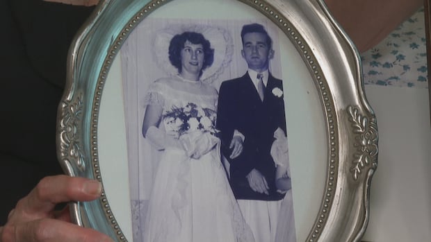 Black and white photo of a couple on their wedding day