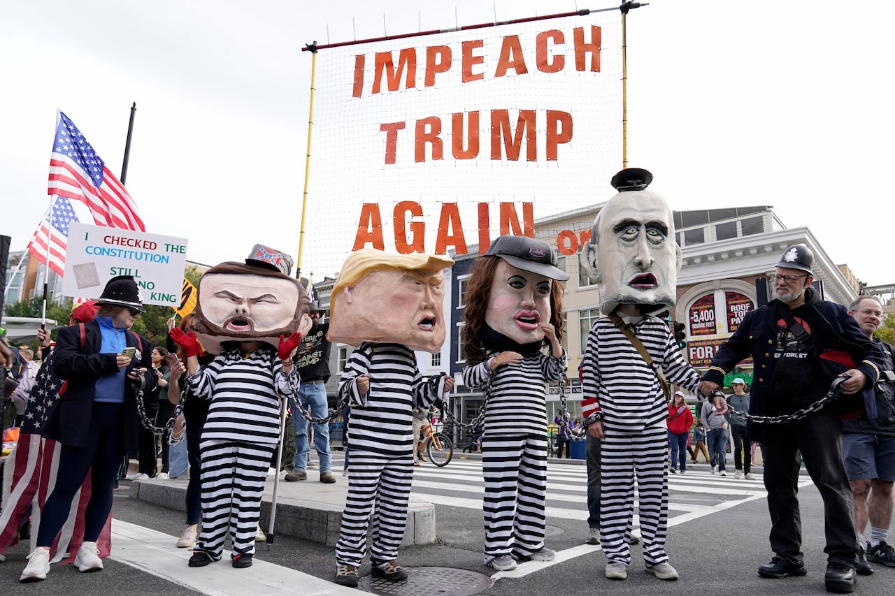 Demonstrators were seen wearing cartoon costumes of various administrative authorities.
