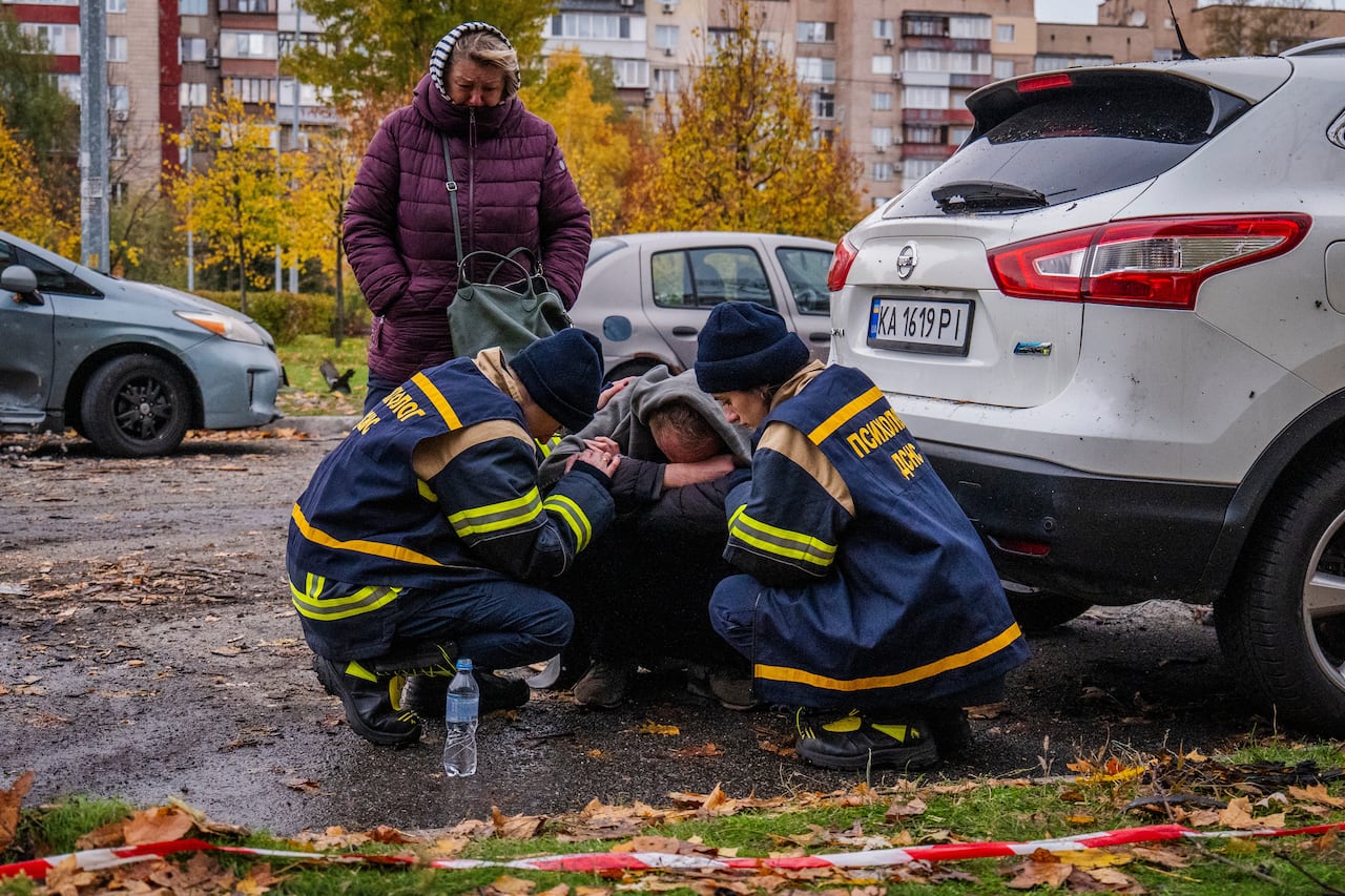 The person is driven as the first responders tend to him.