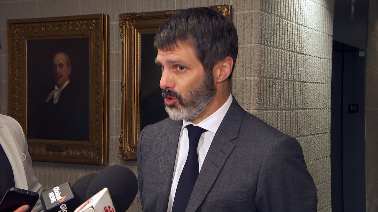 man talking into a mates  microphones