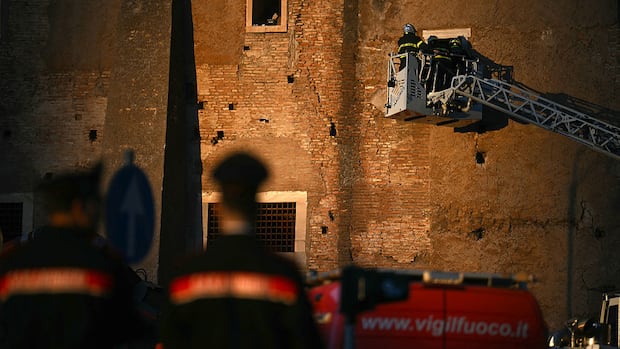 A man is thrown from a collapsing tower in Rome and dies shortly afterwards
