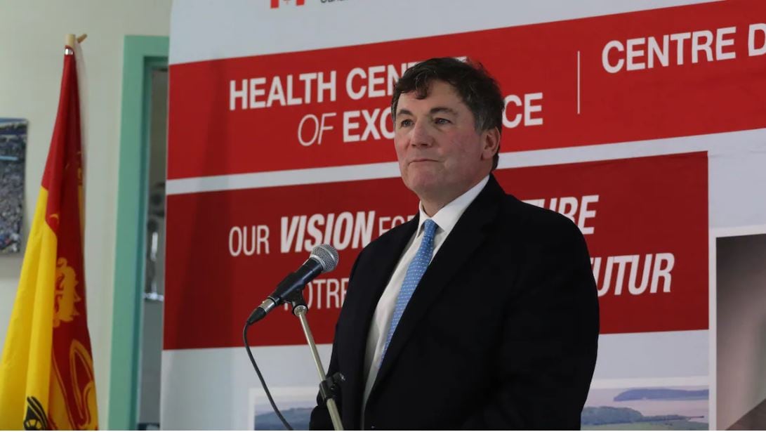 Dominic LeBlanc speaks into a microphone.