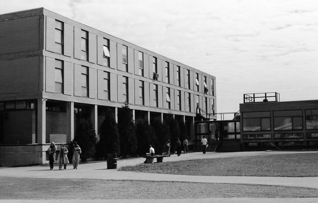 The campus at St. Pius X High School in the mid-to-late 1970s. The shooting took place in the building on the left which contained Classroom 71. Shawn Charland and others were seated in the cafeteria, shown on the right.