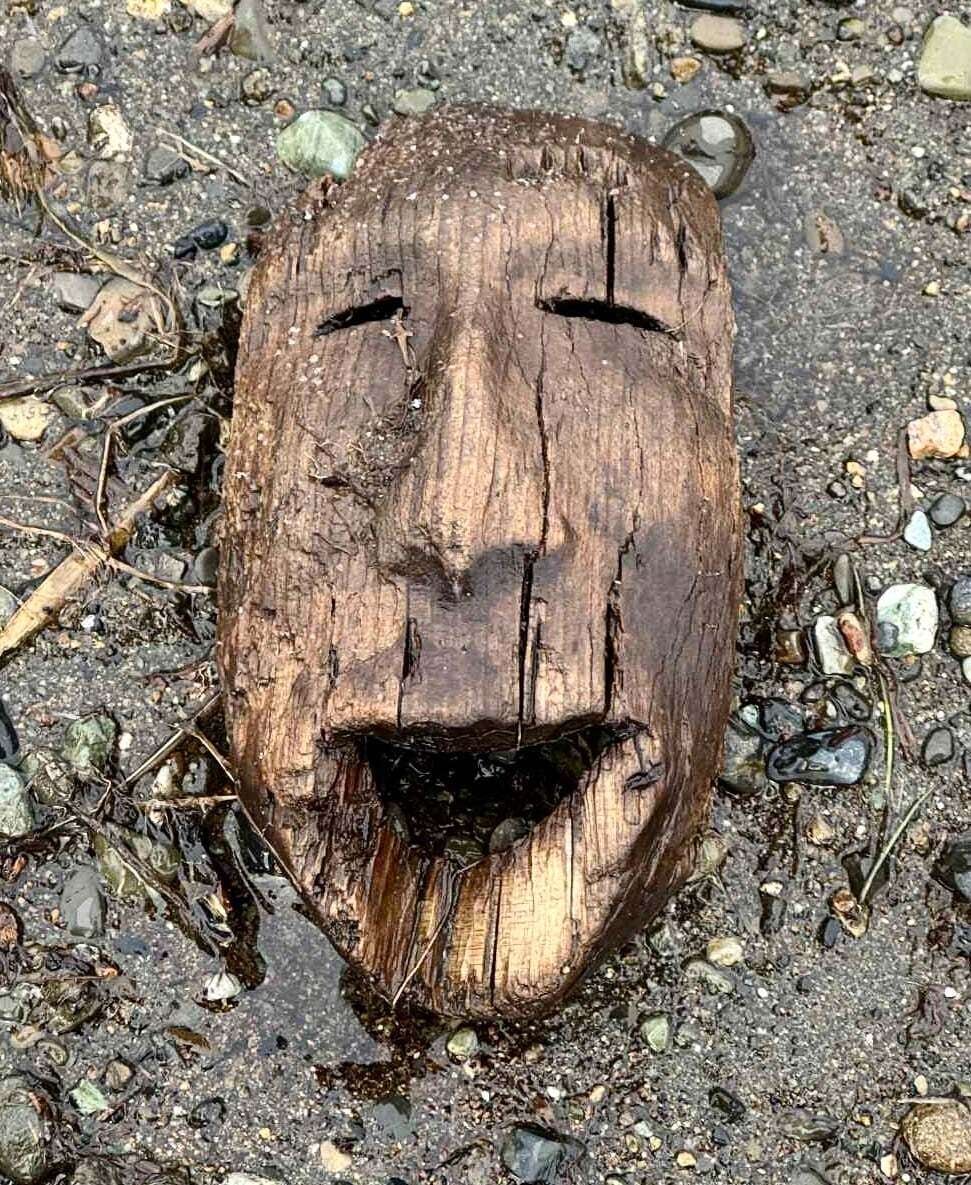 A carved wooden mask