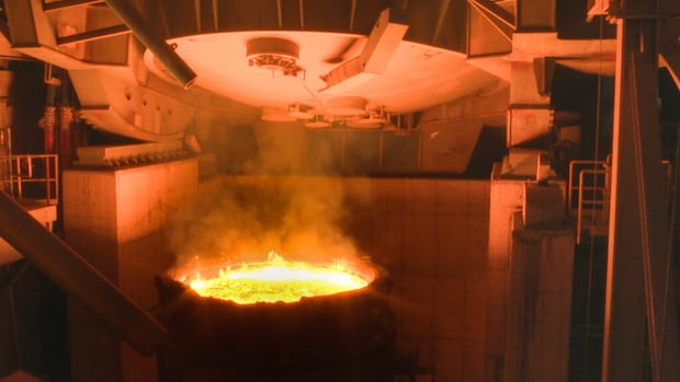 Algoma Steel Inc. produced its first batch of steel with its electric arc furnace in Sault Ste. Marie in July 2025. molten liquid in a round open drum