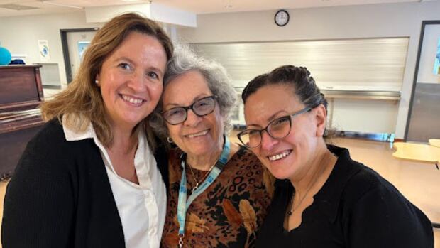 Three women pose for photo in Montreal CHSLD.